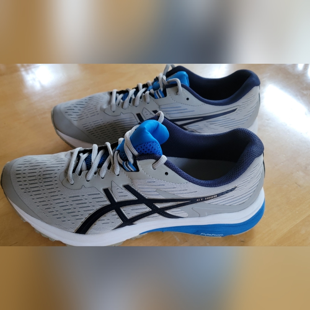 Asic GT-1000 gray/blue running shoes size 11.5 US or 46 Euro.